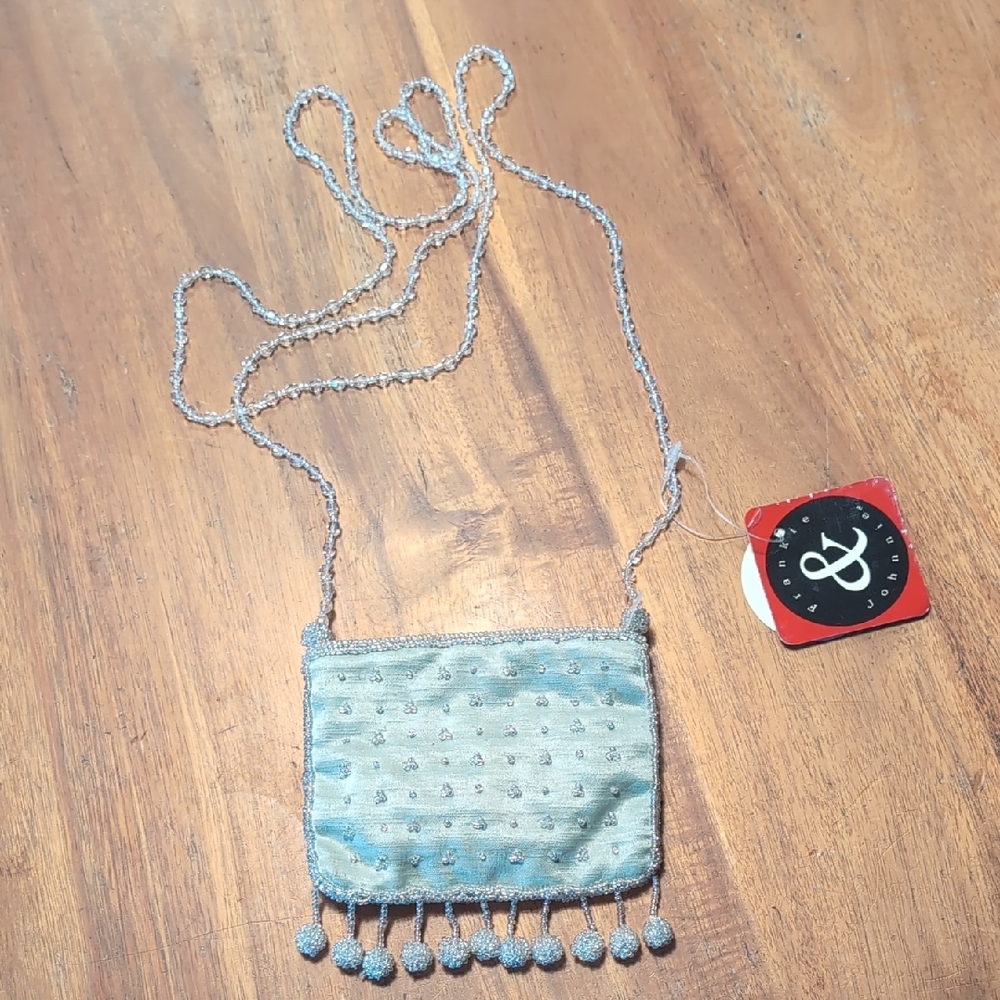 Chic Blue Mini Bag with Intricate Design